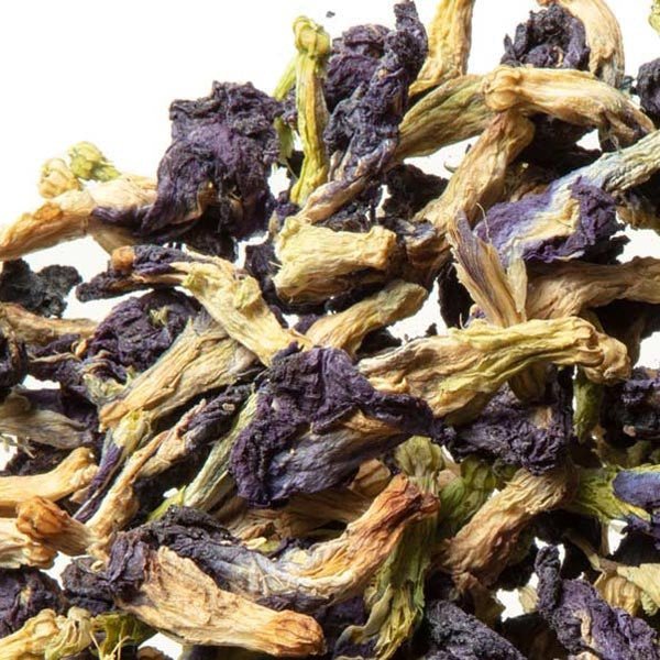 Close-up of organic dried butterfly pea flowers in deep blue and purple