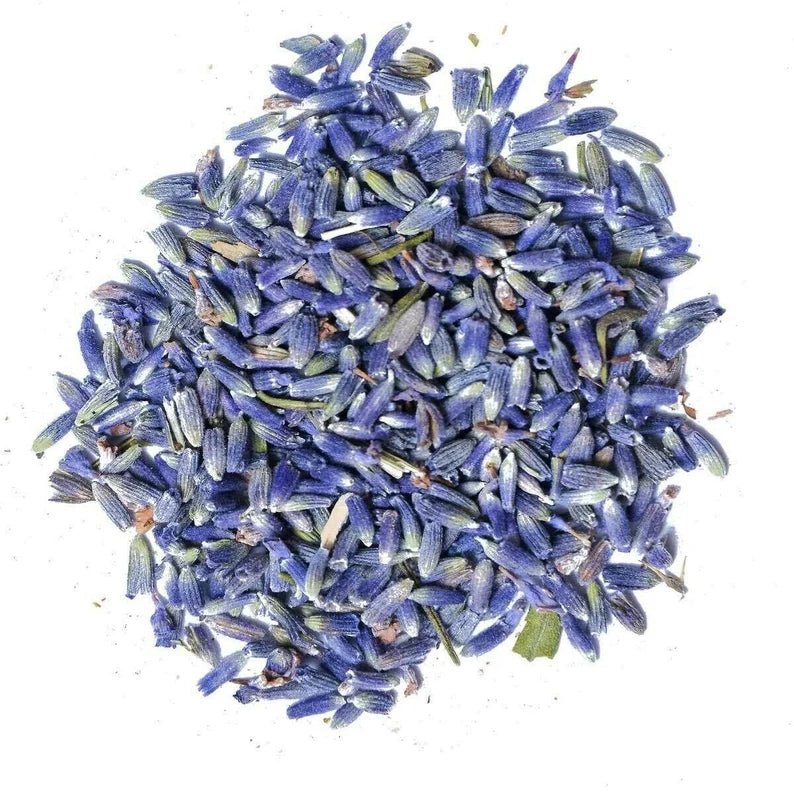 Pile of organic dried lavender buds on a white background