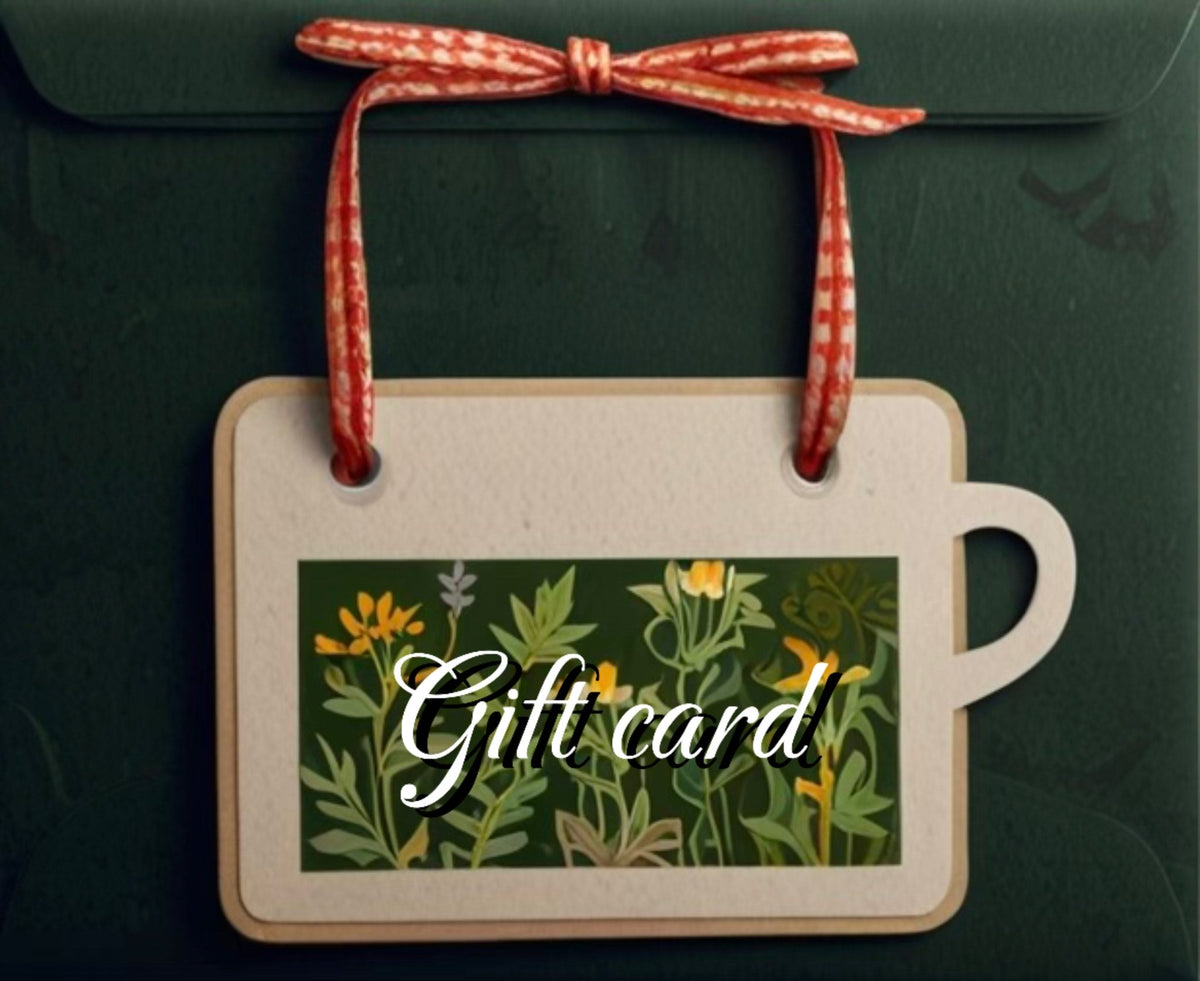 The Turmeric Tart gift card shaped like a mug, tied with a twine bow on a dark green background