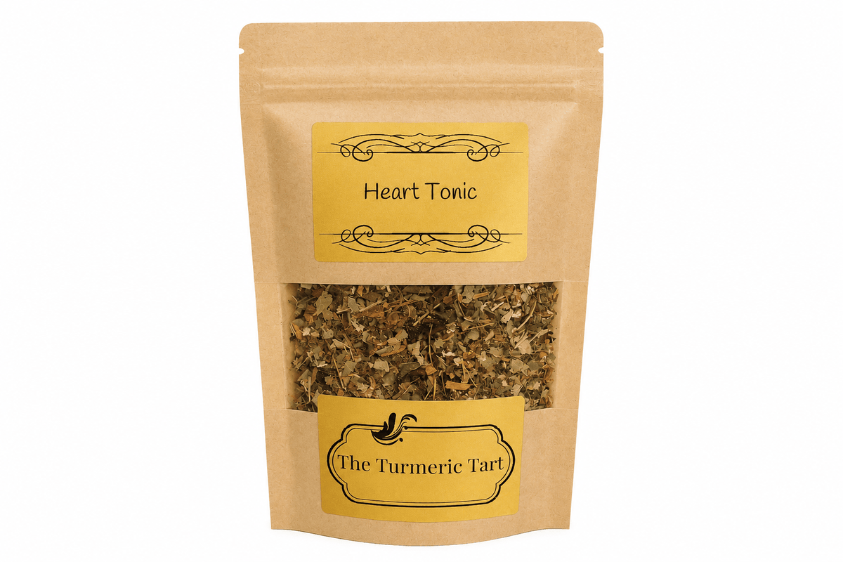 Heart Tonic loose leaf herbal tea in a kraft pouch with a window, by The Turmeric Tart
