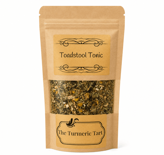 Toadstool Tonic loose leaf herbal tea in a kraft pouch with a window, by The Turmeric Tart