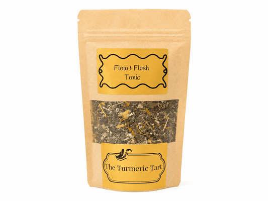 Flow & Flush Tonic loose leaf herbal tea in a kraft pouch with a window, by The Turmeric Tart